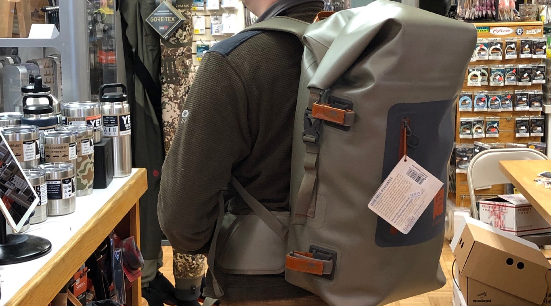 Gear Review: The Fishpond Wind River Roll-Top Backpack - The Compleat Angler